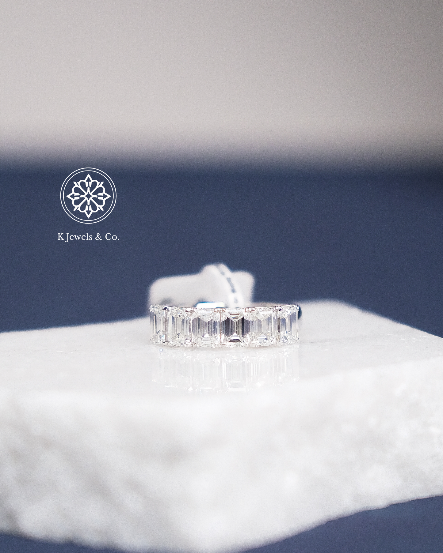 Half Eternity Emerald Cut Diamond Ring